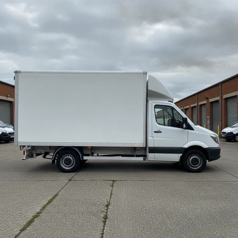 The side profile of a Luton box van, showing its full length