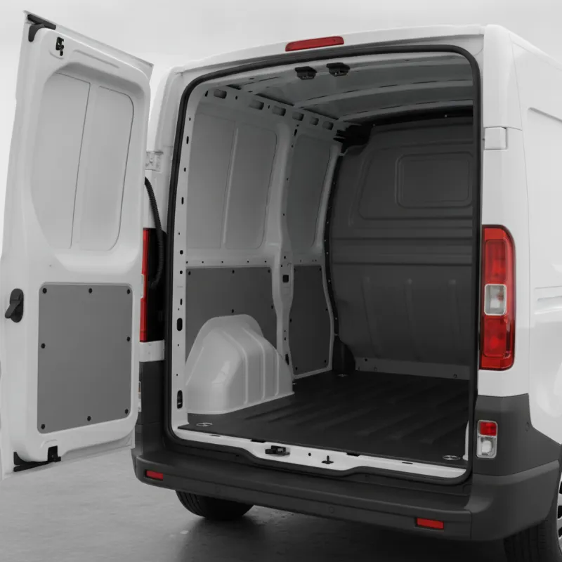 Vauxhall Vivaro panel van load area with steel bulkhead, viewed through open side doors